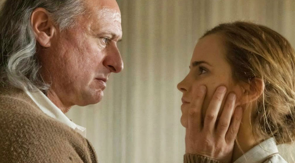 Michael Nyqvist ed Emma Watson in una scena del film. Colonia (2015)